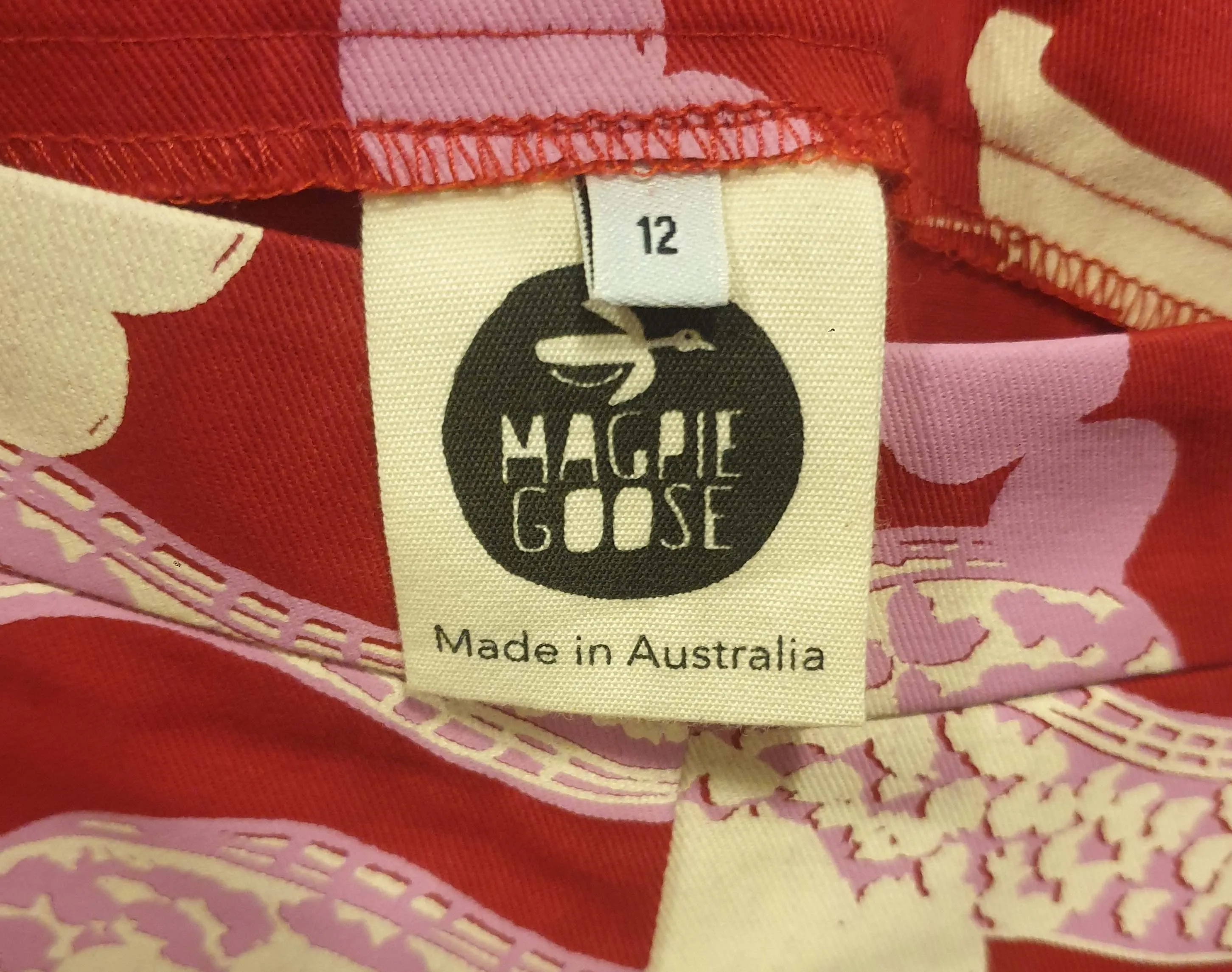 Magpie Goose red print shorts size 12