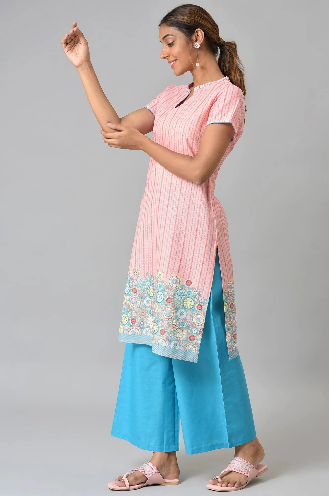 Peach Printed kurta With Blue Palazzos